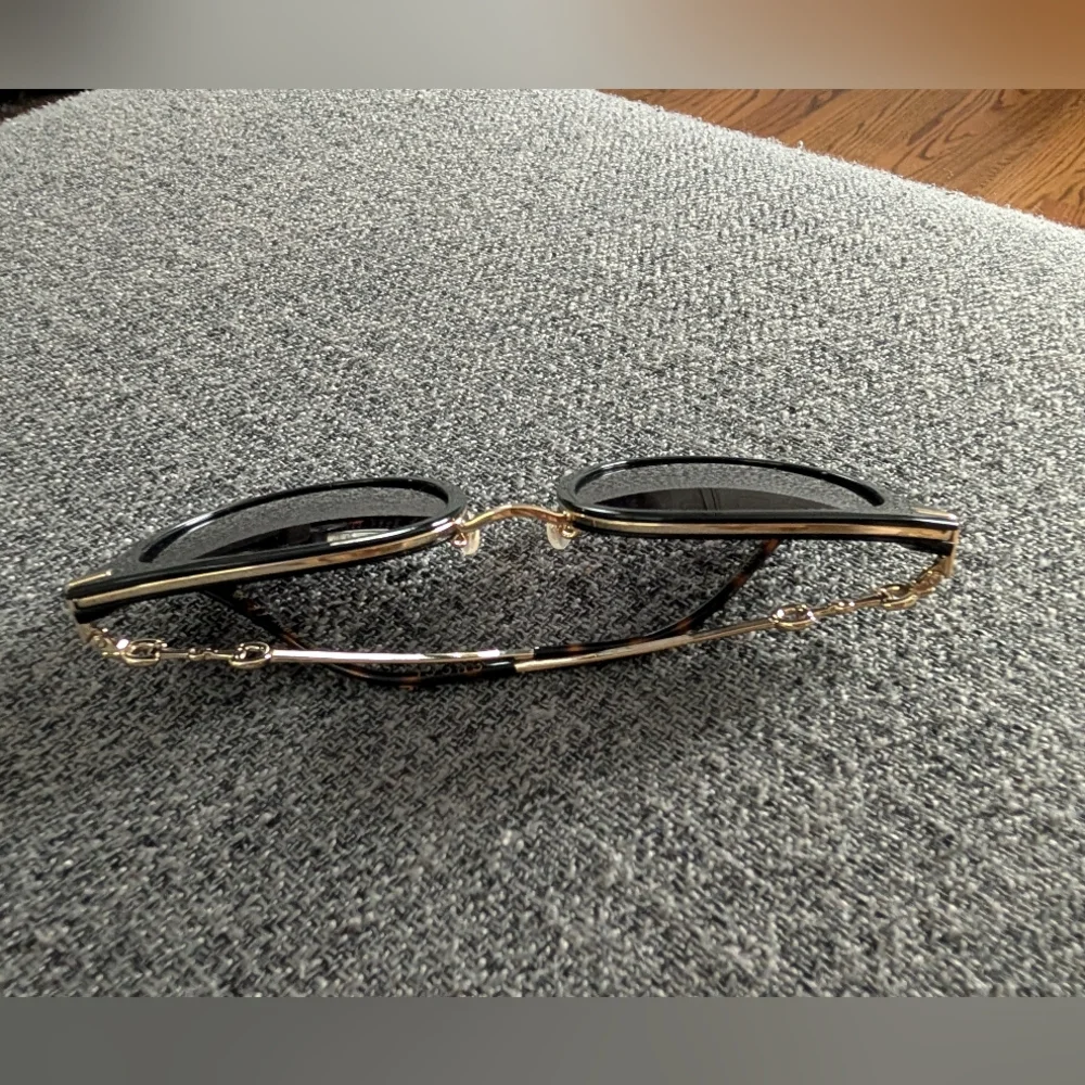 Gucci Women's Sunglasses in Black and Gold